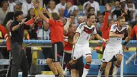 Pria berdarah Turki ini melakoni debut bersama timnas Jerman pada 2009. Hiingga Piala Dunia 2018, ia telah tampil 92 kali dan mencetak 23 gol. (AFP/Odd Andersen)