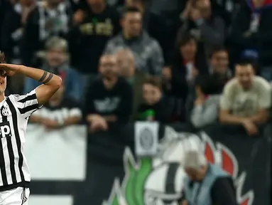 Paulo Dybala mencetak dua gol saat Juventus menaklukkan Lazio 3-0 pada lanjutan Serie A di Stadion Juventus, Turin, Kamis (21/4/2016) dini hari WIB. (AFP/Marco Bertorello)