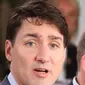 Perdana Menteri Kanada Justin Trudeau menyampaikan pernyataan pers untuk KTT G7 di Quebec. (Ludovic Marin/AFP)