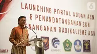 Menkominfo Johnny G. Plate memberikan sambutan saat penandatangan kerja sama pembuatan portal aduan untuk aparatur sipil negara (ASN) di Jakarta, Selasa (12/11/2019). Portal beralamat aduanasn.id. ini untuk melaporkan ASN terkait dengan penanganan radikalisme(Liputan6.com/Faizal Fanani)