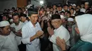 Jokowi disambut oleh Pimpinan Pondok Pesantren Tebu Ireng, KH Salahudin Wahid alias Gus Sholah (Liputan6.com/Herman Zakharia)