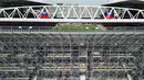 Untuk Piala Dunia 2026, kapasitas ditingkatkan menjadi 45.000 kursi melalui penambahan sementara dari sekitar 28.000 hingga 30.000. Tampak dalam foto, tempat duduk tribun sementara dipasang di BMO Field, Toronto, Kanada, pada Selasa 24 Maret 2026. (Cole BURSTON/AFP)