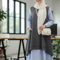 Ilustrasi Gamis untuk Muslimah Pekerja/Gemini AI