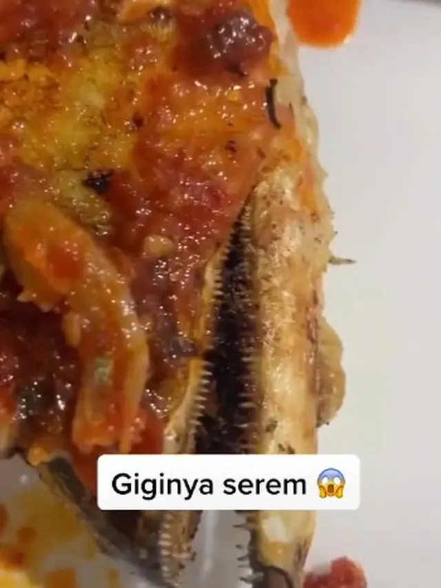 Sultan! Wanita ini Goreng Arwana Peliharaan Untuk Dimakan