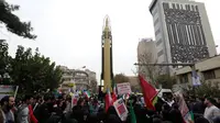 Sambil Bawa Rudal, Iran Rayakan 38 Tahun Perebutan Kedubes AS (ATTA KENARE / AFP)