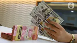 Rupiah Perkasa Menuju Akhir Pekan, Negosiasi Iran Bikin Dolar Tertekan