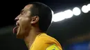 Ekspresi kapten Australia, Tim Cahill, setelah mencetal gol ke gawang Jordania dalam laga kualifikasi Piala Dunia 2018 di Stadion Sepak bola Sydney, Australia, (29/3/2016). (Reuters/David Gray)