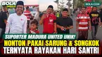 Ada pemandangan unik di Stadion Gelora Madura Ratu Pamelingan, Pamekasan, saat Madura United menghadapi Persib Bandung pada Kamis (22/10/2026). Sejumlah suporter Laskar Sape Kerap datang ke stadion mengenakan sarung dan songkok hitam, tetapi tetap me...