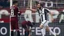 Ekspresi striker Juventus, Gonzalo Higuain, setelah mencetak gol ke gawang Torino dalam laga pekan ke-16 Serie A 2016-2017 di Stadion Olimpico Grande Torino, Minggu (11/12/2016). (AFP/Marco Bertorello)