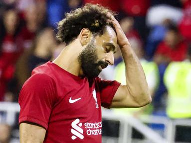 Liverpool dipaksa menyerah dengan skor 1-3 kala menghadapi Lyon dalam laga Dubai Super Cup yang digelar di Al Maktoum Stadium, Dubai, Minggu (11/12/2022). (AFP/Karim Sahib)