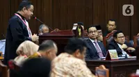Pasangan Calon Presiden-Calon Wakil Presiden nomor urut 1 Anies Baswedan-Muhaimin Iskandar saat mengikuti sidang perdana perselisihan hasil pemilihan umum (PHPU) 2024 di Mahkamah Konstitusi, Jakarta, Rabu (27/3/2024). (Liputan6.com/Angga Yuniar)
