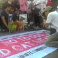 Demo penolakan konsumsi daging anjing dan kucing di lokasi Car Free Day, Jakarta. (Liputan6.com/Ahmad Romadoni)