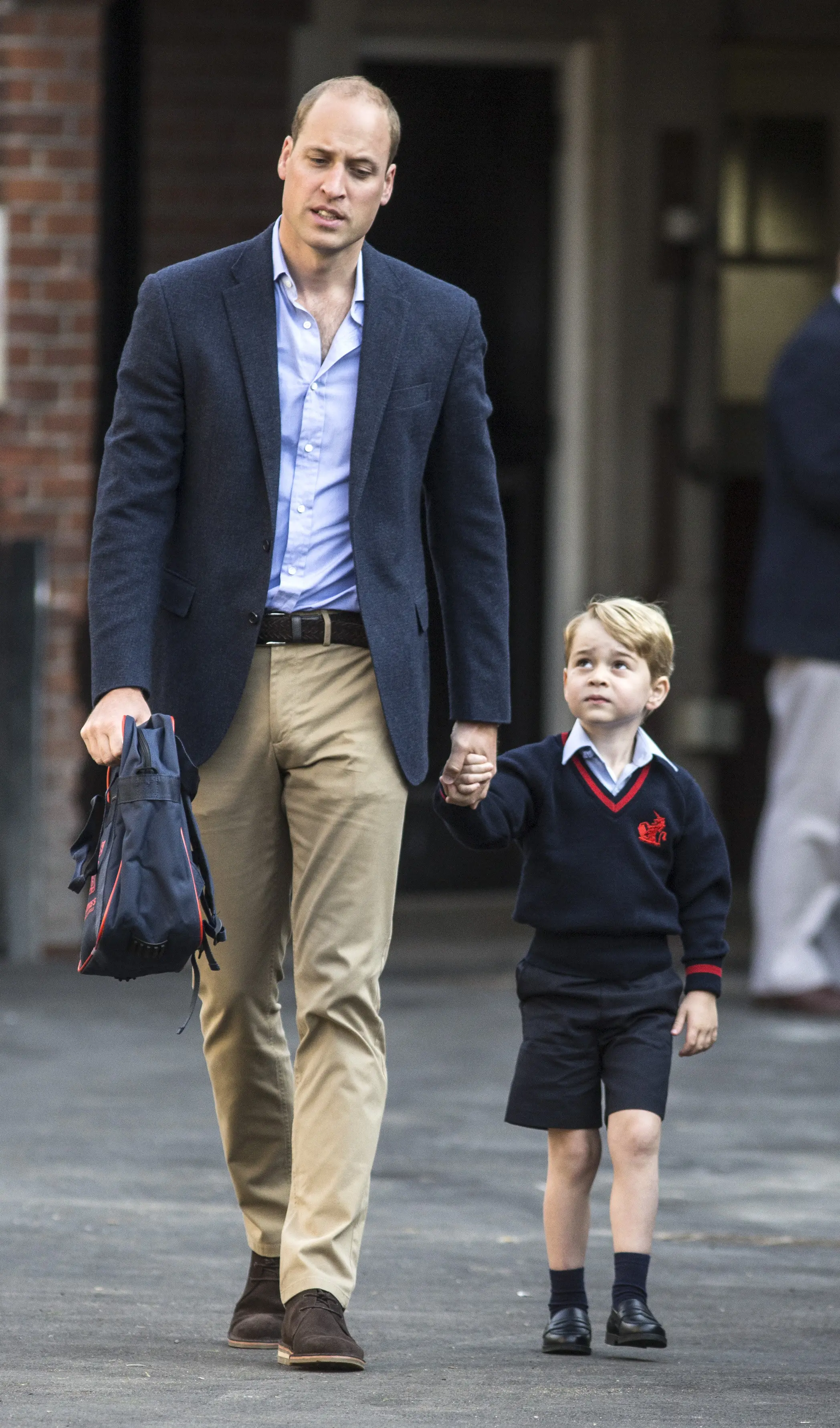 Pangeran George dan Pangeran William. (AFP/RICHARD POHLE)