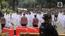 961 kepala daerah tersebut terdiri dari 33 gubernur dan 33 wakil gubernur, 363 bupati, 362 wakil bupati, 85 wali kota, dan 85 wakil wali kota yang dilantik dalam satu rangkaian prosesi pelantikan. (Liputan6.com/Herman Zakharia)