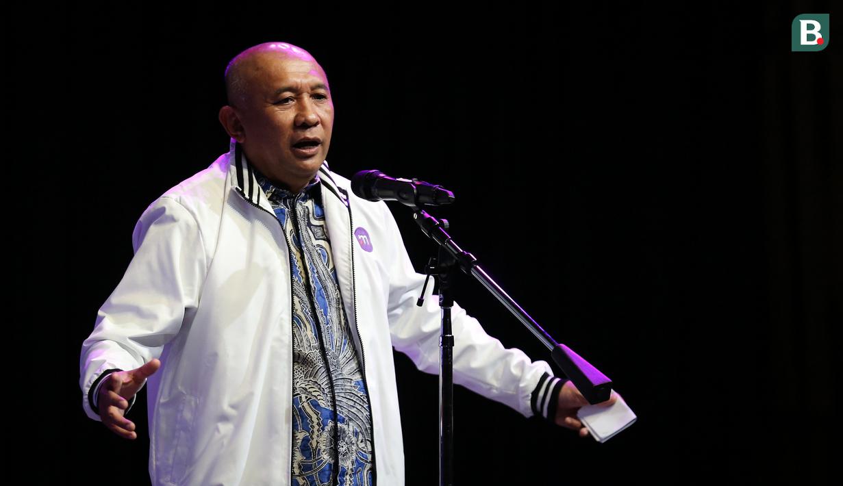 Menteri Koperasi dan Usaha Kecil dan Menengah Indonesia, Teten Masduki memberikan sambutan saat Perayaan Hari Jadi dan Grand Launching Logo Baru Merdeka.com yang berlangsung di SCTV Tower, Senayan, Jakarta, Selasa (21/02/2023). (Bola.com/Bagaskara Lazuardi)