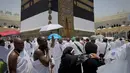 Umat Muslim melakukan tawaf mengelilingi Ka'bah, selama ibadah haji tahunan, di Mekah, Arab Saudi, Kamis 21 Mei 2026. (AP Photo/Altaf Qadri)
