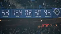 Jam legendaris di markas Hamburg SV yang menandai durasi waktu partisipasi mereka di kasta tertinggi sistem kompetisi sepak bola Jerman. (Twitter)