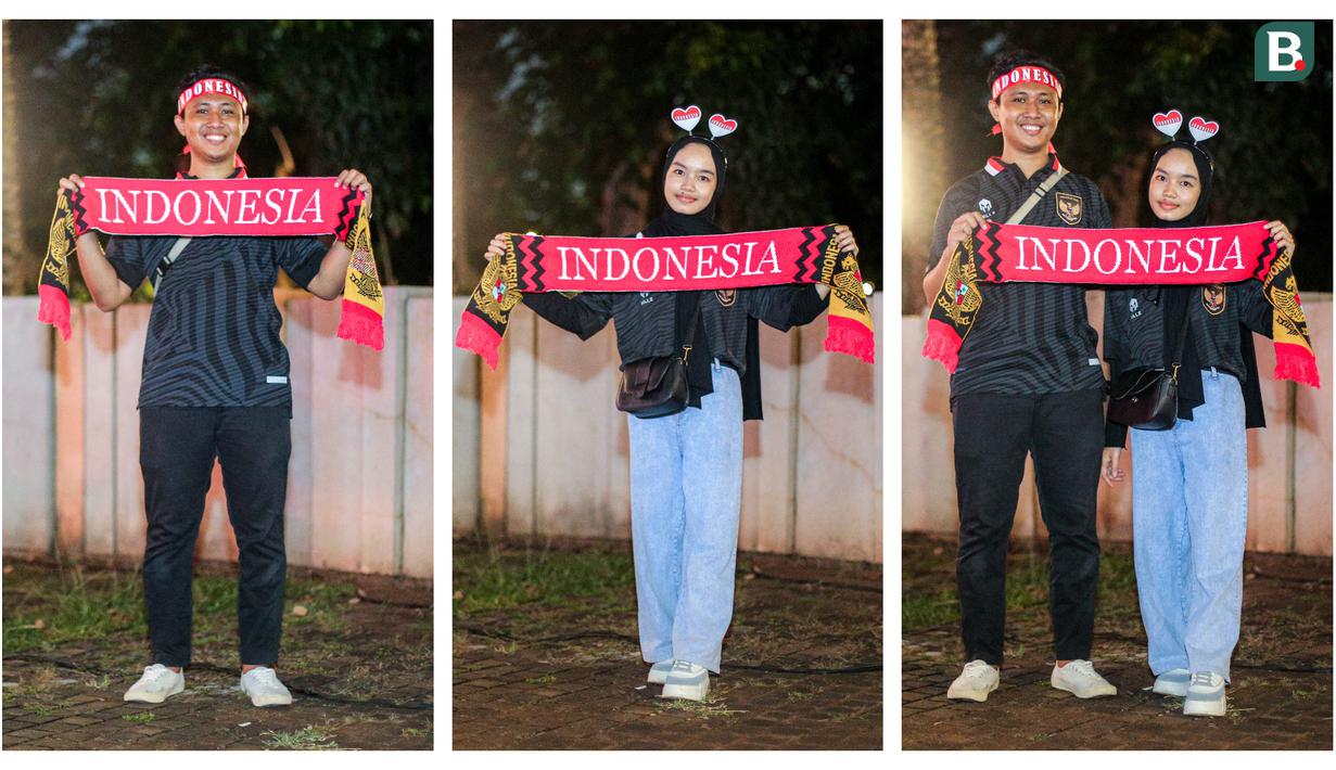 Farhan Al Farizqi (kiri) dan Dinda Russetyaningsih merupakan sepasang kekasih yang ikut datang nonton bareng laga semifinal Piala Asia U-23 antara Timnas Indonesia U-23 melawan Uzbekistan U-23 di Kompleks Stadion Utama Gelora Bung Karno (SUGBK), Senayan, Jakarta, Senin (30/04/2024). (Bola.com/Bagaskara Lazuardi)