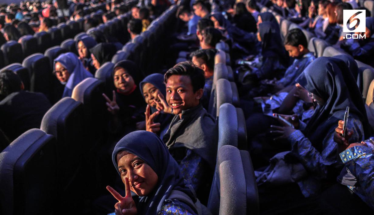 Peserta Emtek Goes To Campus (EGTC) 2018 memadati Auditorium Kampus Timur, Universitas Kristen Petra, Surabaya, Rabu (14/11). Gelaran EGTC ini juga akan menjadi ajang berbagi pengetahuan antar praktisi untuk para mahasiwa. (Liputan6.com/Faizal Fanani)