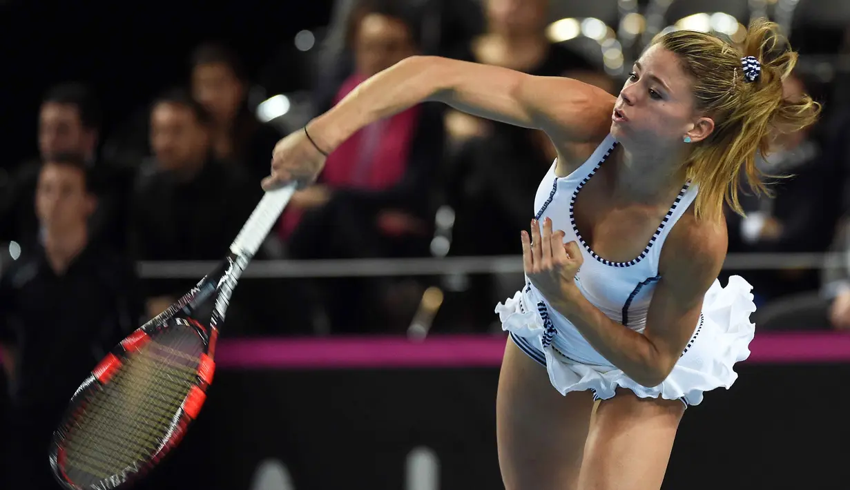 Camila Giorgi mempunyai tinggi badan 168 cm dan mulai bermain di kanacha tenis profesional sejak tahun 2006. (AFP/Anne-Christine Poujoulat)