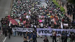 Dewan Perwakilan Rakyat (DPR) Republik Indonesia resmi mengesahkan Rancangan Undang-Undang Perubahan atas Undang-Undang Nomor 34 Tahun 2004 tentang Tentara Nasional Indonesia atau RUU TNI menjadi Undang-Undang. (BAY ISMOYO/AFP)