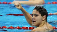 Joseph Schooling (Singapura) meraih medali emas untuk nomor 100 meter gaya kupu-kupu di Olimpiade 2016.  REUTERS/Stefan Wermuth