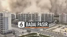 Badai pasir yang tebal menerjang daerah Donhuang China hari Minggu (25/7). Gedung-gedung kota itu diselimuti pekatnya pasir dan debu yang berwarna cokelat tua.