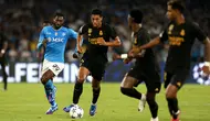 Gelandang Real Madrid, Jude Bellingham, memilih merendah setelah gol yang dicetaknya ke gawang Napoli dianggap mirip dengan ciri khas Diego Maradona. (AFP/Carlo Hermann)