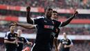 Pemain Watford, Odion Ighalo, merayakan gol yang dicetaknya ke gawang Arsenal pada putaran keenam Piala FA di Stadion Emirates, London, Minggu (13/3/2016). (Action Images via Reuters/Tony O'Brien)