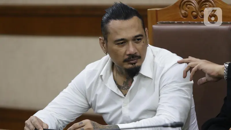 FOTO: Kasus Pengancaman, Jerinx SID Divonis Satu Tahun Penjara dan Denda Rp 25 juta