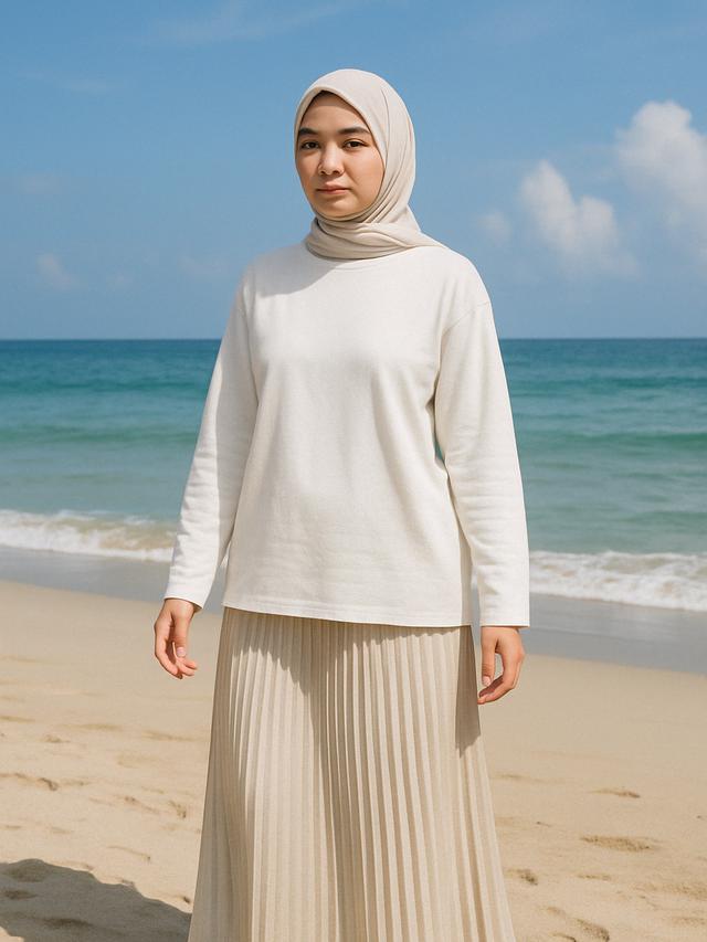 Outfit ke Pantai Hijabers yang Simpel tapi Dijamin Cantik (Foto: Rizka Nur Laily via ChatGPT)