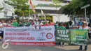 Sejumlah warga menggelar aksi di sekitar lokasi Ledakan Thamrin, Jakarta, Minggu (17/1/2016). Mereka mengajak seluruh warga Jakarta untuk tidak takut pada teroris (Liputan6.com/Faisal R Syam)