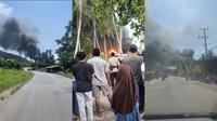 Tangkapan layar rekaman video amatir warga memperlihatkan kondisi asap membumbung tinggi dari sebuah gudang BBM yang terbakar. Foto: (Istimewa).