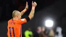 Kapten Belanda, Arjen Robben, memutuskan untuk pensiun dari timnas setelah gagal lolos ke Piala Dunia. Winger Bayern Munchen ini mencatat 96 caps dengan mencetak 37 bersama Der Oranje. (AFP/Emmanuel Dunand)