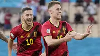 Thorgan Hazard - Pemain yang berposisi gelandang ini menjadi pembeda pada laga melawan Portugal di babak 16 besar Euro 2020. Hazard menjadi pencetak gol satu-satunya dan sekaligus memastikan Belgia meraih satu tiket ke perempat final. (AP/Thanassis Stavrakis, Pool)