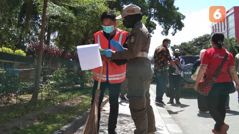 pemberian sanksi terhadap pelanggar protokol kesehatan di Kota Palu