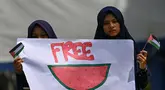 Para aktivis pro-Palestina mengambil bagian dalam aksi protes terhadap tindakan Israel di Gaza, di Banda Aceh pada 18 Mei 2024. (CHAIDEER MAHYUDDIN/AFP)