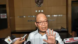 Melalui kuasa hukumnya, Pertamina melaporkan ketua PN Jakarta Pusat atas upaya penyitaan aset negara yang kasusnya sudah dimenangkan Pertamina di tingkat Mahkamah Agung, (25/9/14). (Liputan6.com/Miftahul Hayat) 