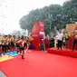 Gubernur Jawa Tengah Ganjar Pranowo dan istri Siti Atikoh, turut mengikuti Bank Jateng Friendship Run Jakarta yang dimulai di Lapangan Banteng, Jakarta Pusat. (Istimewa)