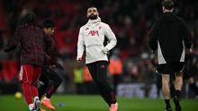 Penyerang Liverpool, Mohamed Salah, melakukan pemanasan menjelang pertandingan Liga Inggris antara Liverpool dan Sunderland di Anfield, Liverpool, Inggris barat laut, pada 3 Desember 2025. (Paul ELLIS / AFP)