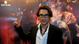 Aktor Agus Kuncoro saat menghadiri gala premiere WEWE di Epicentrum XXI, Jakarta, Senin (13/4/2015). (Liputan6.com/Faisal R Syam)
