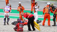 Selain  Enea Bastianini, empat pembalap lainnya yang mengalami kecelakaan yaitu Johann Zarco, Marco Bezzecchi, Alex Marquez, dan Fabio Di Giannantonio. (AFP/Josep Lago)
