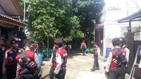 Suasana rekonstruksi pembunuhan bocah di dalam karung (Liputan6.com/Achmad Sudarno)