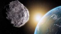 Ilustrasi asteroid mendekati Bumi. (Via: telegraph.co.uk)