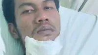 Salah satu korban penembakan di Desa Sontang, Kabupaten Rokan Hulu. (Liputan6.com/M Syukur)