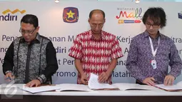 Suasana penandatanganan MoU kerjasama kemitraan penggunaan Mandiri e-cash antara Bank Mandiri, Pertamina dan MatahariMall, Jakarta, Rabu (23/9/2015). (Liputan6.com/Angga Yuniar)