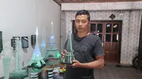 Akrobat Mantan TKI Bisnis Miniatur Monas hingga Menara Eiffel (Liputan6.com/Dian Kurniawan)