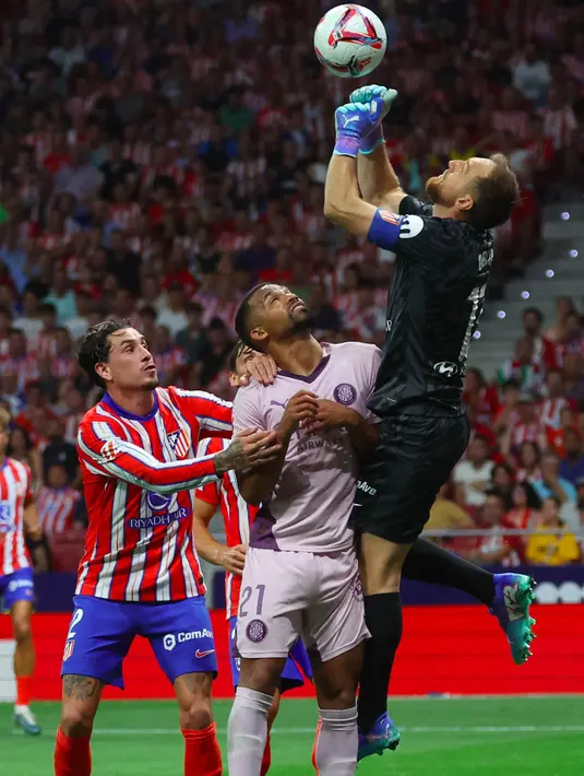 Bermain di markas sendiri, Atletico Madrid tampil menyerang sejak menit awal pertandingan. (Pierre-Philippe MARCOU/AFP)