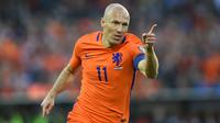 Arjen Robben tercatat telah mengemas total 37 gol dari 97 laga bersama Timnas Belanda. Dipanggil sejak 2003 hingga 2017, Robben menjadi kunci sukses Timnas Belanda melaju ke partai final Piala Dunia 2010 dan juara ketiga Piala Dunia 2014. (AFP/John Thys)