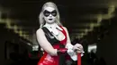 Kaylessi mengenakan kostum dengan karakter Harley Quinn pada hari kedua New York Comic Con di Manhattan, New York, Jumat (9/10/2015). (REUTERS/Andrew Kelly)